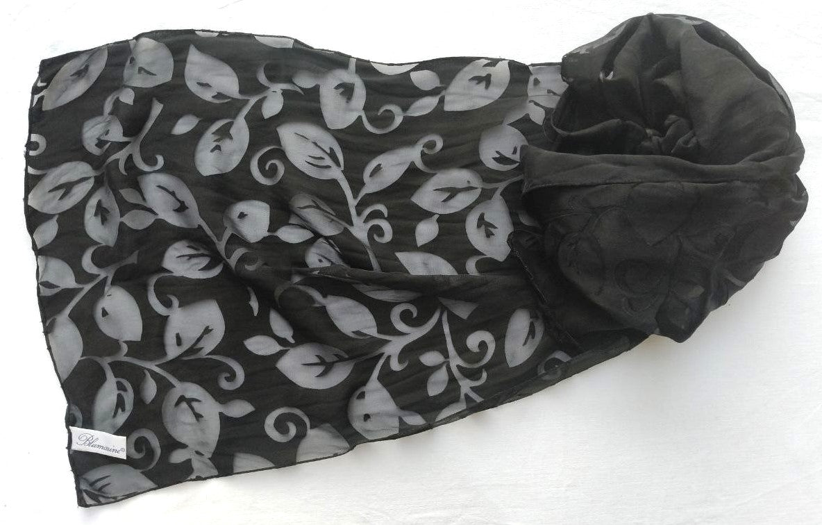 Stola Blumarine in seta e viscosa nera con motivo foglie (Made in Italy)